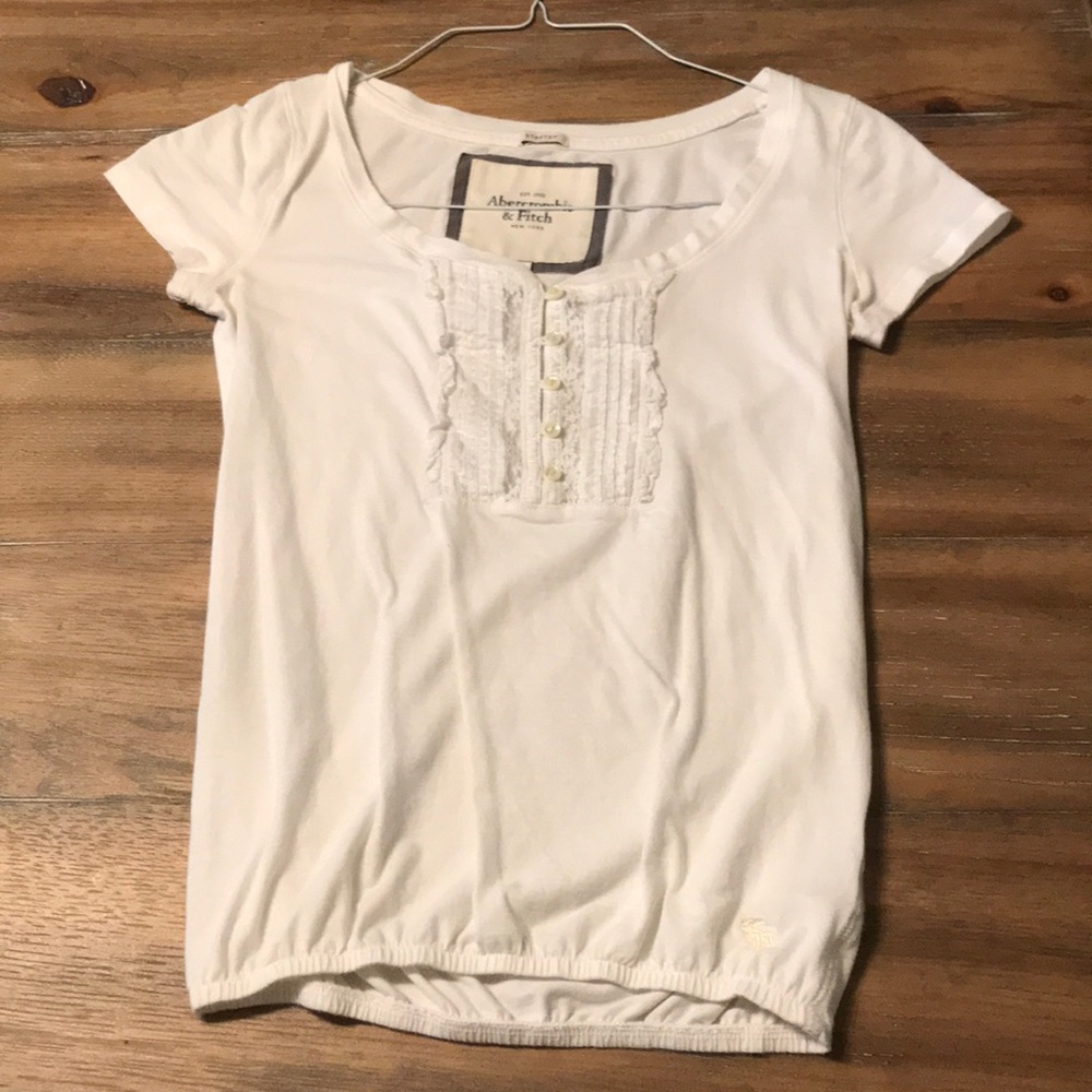 white tight fitted blouse
